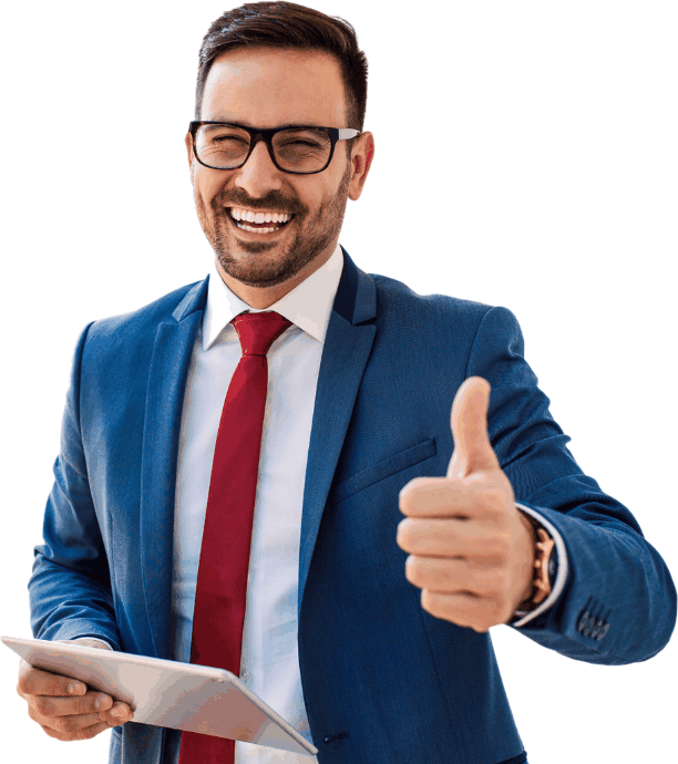 A man in a suit and tie smiling and giving a thumbs up